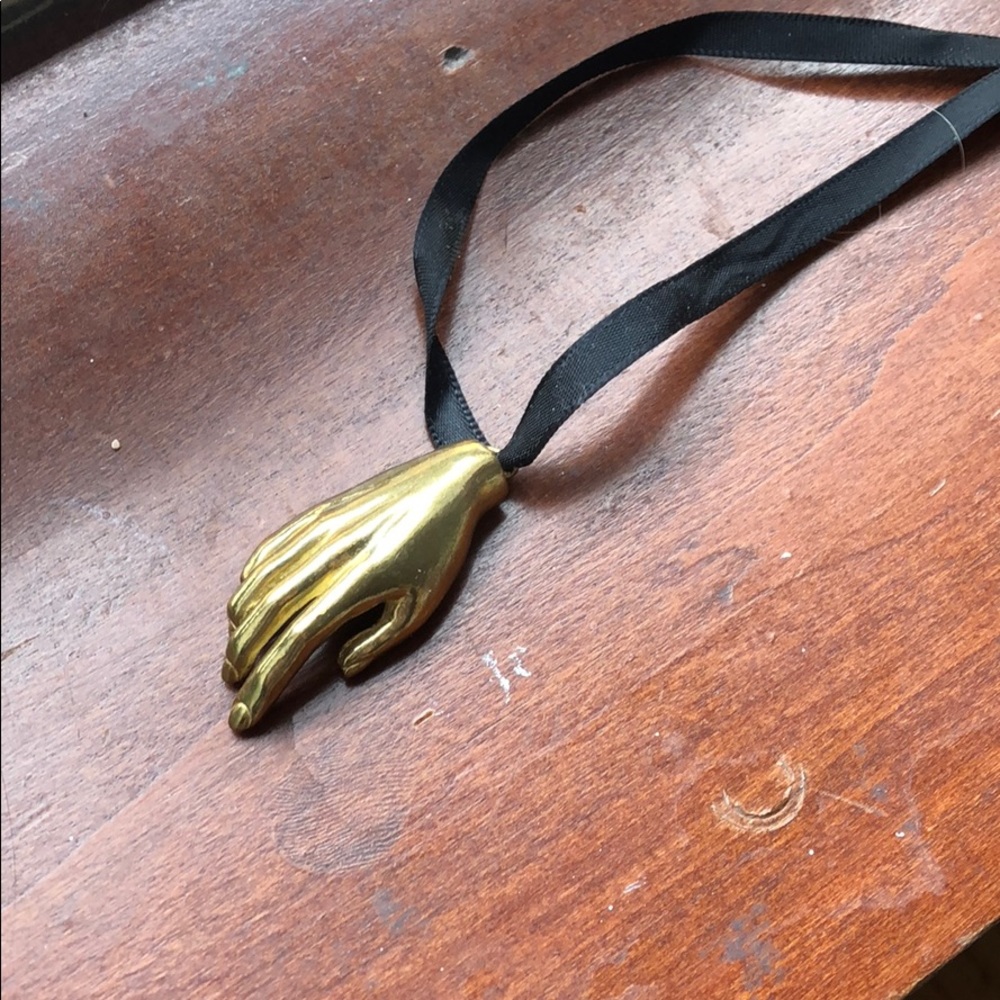 Brass hand pendant